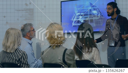 Presenting Indian presenter gesturing at blueprint screen with map overlay in boardroom, copy space Presenting Indian presenter gesturing at blueprint screen with map overlay in boardroom, copy space 135626267