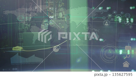 Analyzing network data while Korean analyst typing on laptop amid server racks with green overlays 135627595