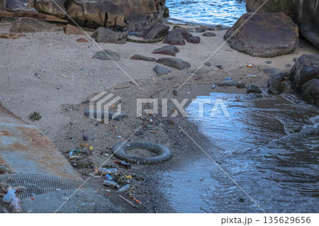 Sept 14 2025 Polluted Beach Showing Litter and Debris Close to Ocean Shoreline Sept 14 2025 Polluted Beach Showing Litter and Debris Close to Ocean Shoreline 135629656