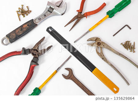 Collection of old used carpenter tools isolated on a white background. Tools series. Collection of old used carpenter tools isolated on a white background. Tools series. 135629864