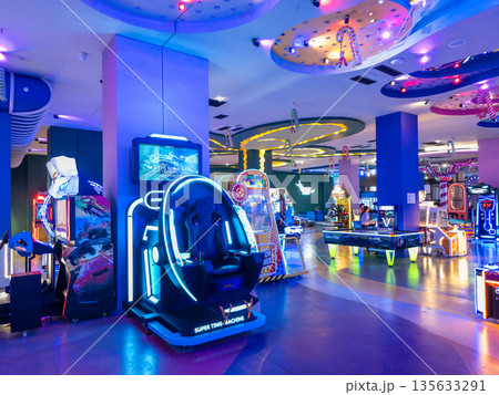 Yerevan Armenia 1.10.2026. A brightly lit room with a blue ceiling and a large gaming area 135633291