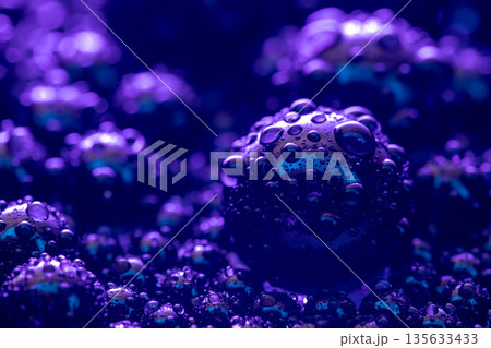 A close up of a purple sphere with many other spheres surrounding it 135633433