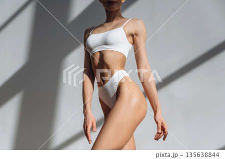 Clean skin. Close up view of woman with slim body type indoors 135638844