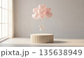 Pink heart shaped balloons floating above a minimalist cylinder podium in a room 135638949