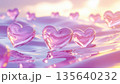Translucent pink jelly hearts float on reflective surface, creating dreamy and romantic atmosphere 135640232