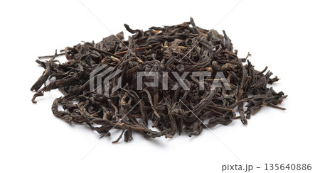 Pile of black tea on white background. 135640886