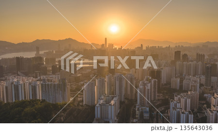 Jan 11 2026 Golden Sunset Over Kowloon Skyline and Victoria Harbour View 135643036