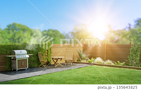 simple beautiful backyard with seating and lush greenery, patio area with green lawn and bbq grill blurred background simple beautiful backyard with seating and lush greenery, patio area with green lawn and bbq grill blurred background 135643825