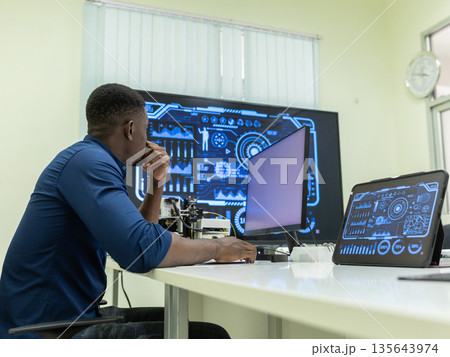 Black Researcher Making a Quantum Computing Experiment Black Researcher Making a Quantum Computing Experiment 135643974
