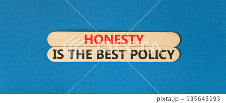 Honesty is the best policy symbol. Concept words Honesty is the best policy on beautiful wooden sticks. Beautiful blue background. Business honesty is best policy concept. Copy space. Honesty is the best policy symbol. Concept words Honesty is the best policy on beautiful wooden sticks. Beautiful blue background. Business honesty is best policy concept. Copy space. 135645193