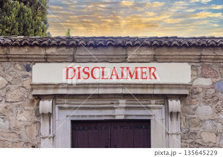 Disclaimer symbol. Concept word Disclaimer on beautiful white marble sign plate. Beautiful ancient stone wall and blue sky background. Business disclaimer concept. Copy space. 135645229