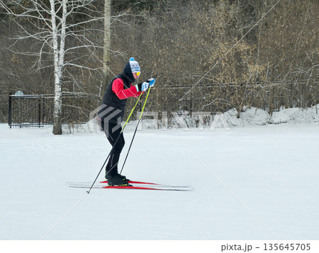 Man Cross Country Skiing Outdoors Winter Landscape Man Cross Country Skiing Outdoors Winter Landscape 135645705