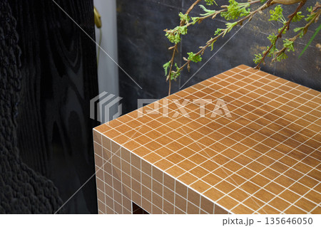 Artistic tile mount featuring natural textured foliage detail 135646050