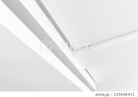 Monochrome abstract photo featuring clean white planes Monochrome abstract photo featuring clean white planes 135646411