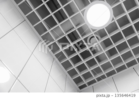 White monochrome interior shot of a tiled ceiling 135646419