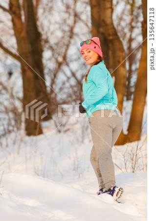 Girl jogging in freezing temperature Girl jogging in freezing temperature 135647118