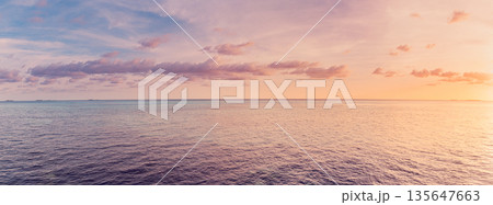Panoramic super wide ocean sunset colorful sky horizon peaceful nature ecology background Panoramic super wide ocean sunset colorful sky horizon peaceful nature ecology background 135647663