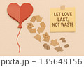 Recycled paper heart balloon deflating into reusable material with sustainable love message on beige background promoting eco friendly relationship and zero waste lifestyle 135648156