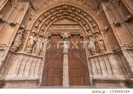 The south portal of Palma Cathedral in Mallorca, Spain, is decorated with depictions such as the Last Supper and the Virgin Mary with the infant Jesus 135648194