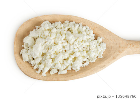 Cottage Cheese, Curd in wooden spoon isolated on white background. Top view. Flat lay 135648760