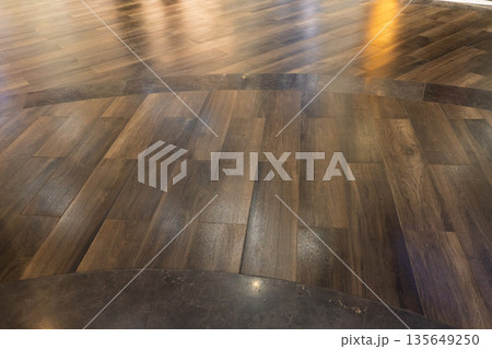 Polished Wooden Floor with Curved Pattern Polished Wooden Floor with Curved Pattern 135649250