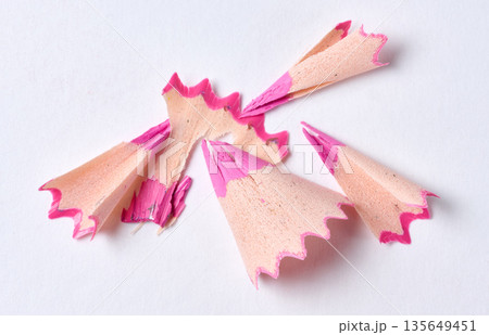 Wooden pink shavings on white background, top view Wooden pink shavings on white background, top view 135649451