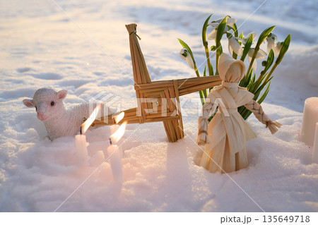 Imbolc brigid's cross, doll, lamb, snowdrops celebrating winter's end 135649718