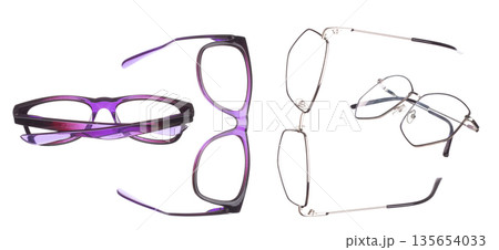 Purple Fashion Glasses fly in air showing many angle rotated. Fashion trend glasses for confident work and beautiful wearing is good for shape of head. White background isolated Purple Fashion Glasses fly in air showing many angle rotated. Fashion trend glasses for confident work and beautiful wearing is good for shape of head. White background isolated 135654033