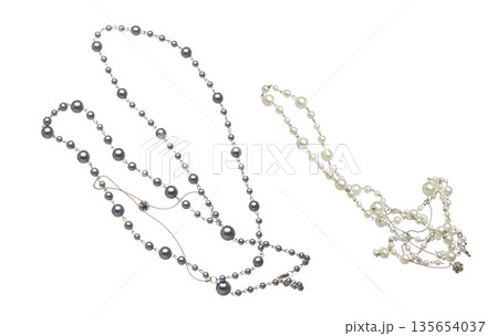 Pearl bead style necklet fly in air. Deep sea pearl bead necklace as gemstone for fashion ornament decorative items. Fashion ornament necklace to add more style. White background isolated Pearl bead style necklet fly in air. Deep sea pearl bead necklace as gemstone for fashion ornament decorative items. Fashion ornament necklace to add more style. White background isolated 135654037