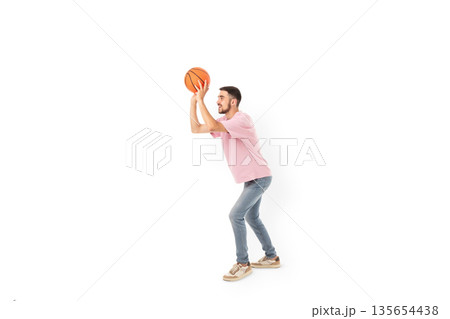 Athlete gets ready to make a basketball shot, isolated, PNG Athlete gets ready to make a basketball shot, isolated, PNG 135654438