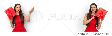 Woman holds red gift boxes and smiles joyfully, isolated, PNG 135654510