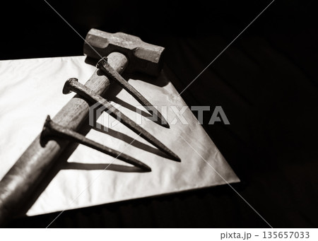 Hammer and nails 135657033