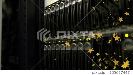 Displaying server rack drive bays in data center, with glowing LEDs and golden star overlays Displaying server rack drive bays in data center, with glowing LEDs and golden star overlays 135657447