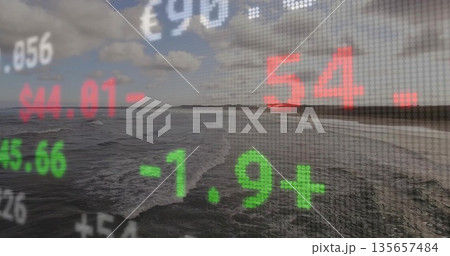 Displaying semi-transparent market overlay streaming over beach at cloudy coast, digital numbers Displaying semi-transparent market overlay streaming over beach at cloudy coast, digital numbers 135657484