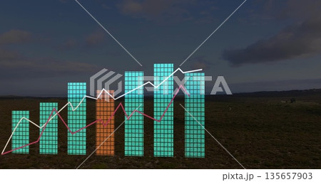 Displaying data chart overlay tracing trends over scrubland plain, with bar charts and line graphs 135657903