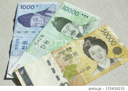 Pile of Korean banknote money. Pile of Korean banknote money. 135658232