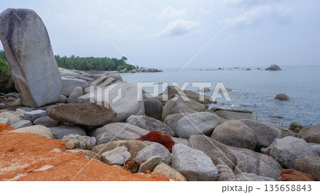 Scenic Coastal View of Siangau Beach with Large Granite Formations 135658843