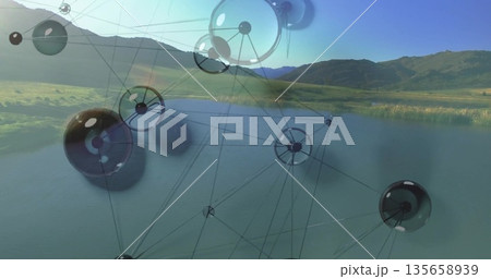 Floating translucent spheres forming data-network structure over calm lake valley with green hills 135658939
