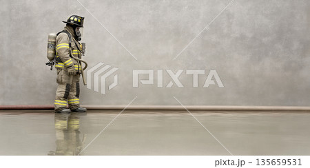 Firefighter in full gear stands beside a wall with reflective floor, holding a hose and wearing a breathing apparatus in a minimalistic indoor environment Firefighter in full gear stands beside a wall with reflective floor, holding a hose and wearing a breathing apparatus in a minimalistic indoor environment 135659531