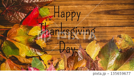 Image of happy thanksgiving day text over fall leaves 135659677