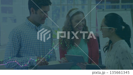 Collaborating three colleagues reviewing data in office with grid windows, with tablet laptop 135661345