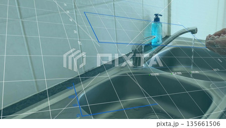 Running chrome faucet pouring water into cupped hand at sink in kitchen, with AR grid overlay 135661506