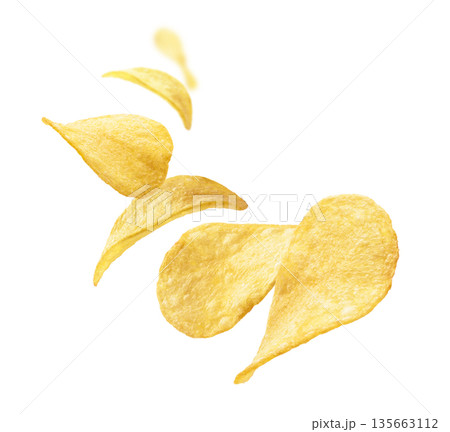 Potato chips levitate on a white background Potato chips levitate on a white background 135663112