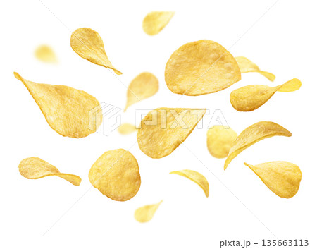 Potato chips levitate on a white background 135663113