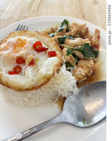 Thai Basil Chicken with Fried Egg (Pad Kra Pao Gai) Thai Basil Chicken with Fried Egg (Pad Kra Pao Gai) 135663488