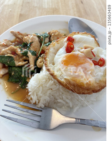 Thai Basil Chicken with Fried Egg and Rice (Pad Krapow Gai) 135663489