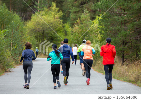 Rear view group people running 135664600