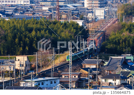 木津川の橋梁を渡るJR奈良線の電車 京都府木津川市城山台城址公園からの眺め➅ 木津川の橋梁を渡るJR奈良線の電車 京都府木津川市城山台城址公園からの眺め➅ 135664875