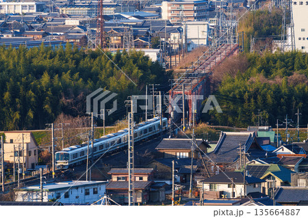 木津川の橋梁を渡るJR奈良線の電車 京都府木津川市城山台城址公園からの眺め⑱ 木津川の橋梁を渡るJR奈良線の電車 京都府木津川市城山台城址公園からの眺め⑱ 135664887