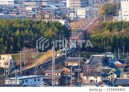 木津川の橋梁を渡るJR奈良線の電車 京都府木津川市城山台城址公園からの眺め㉝ 木津川の橋梁を渡るJR奈良線の電車 京都府木津川市城山台城址公園からの眺め㉝ 135664902